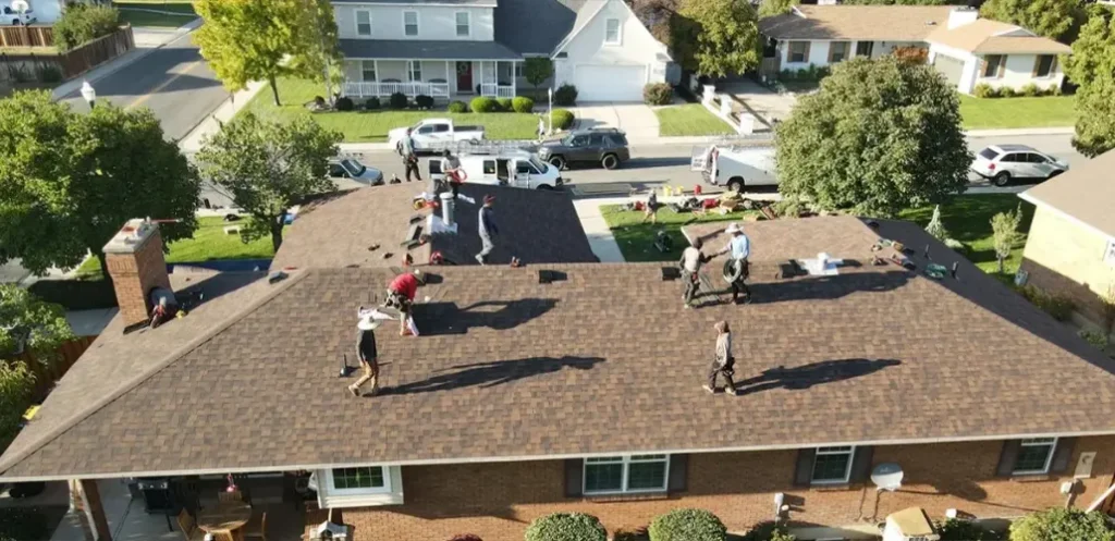 Team Working On Roof Top
